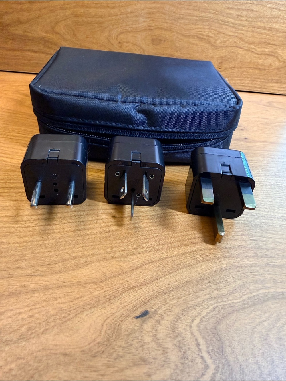 International Electrical Outlet converters Carrying case and 3 converters.